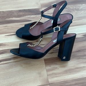 Bally black leather heels with gold chain detail. Size 39.5.
